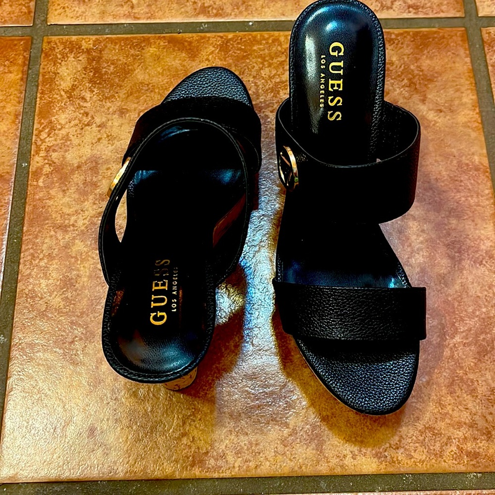 Guess slip on platform wedges. Color black in size 8 M ladies. Cute cork heel!